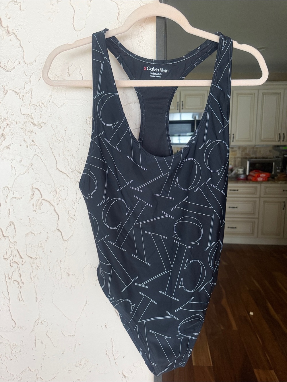 Calvin Klein Black One-Piece Swimsuit with White Logo Print - Picture 2 of 7